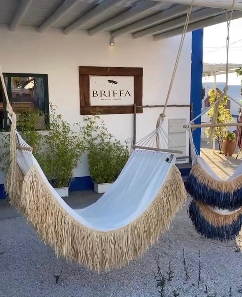 Cambres - garden hammock with handmade raffia fringes and tassels