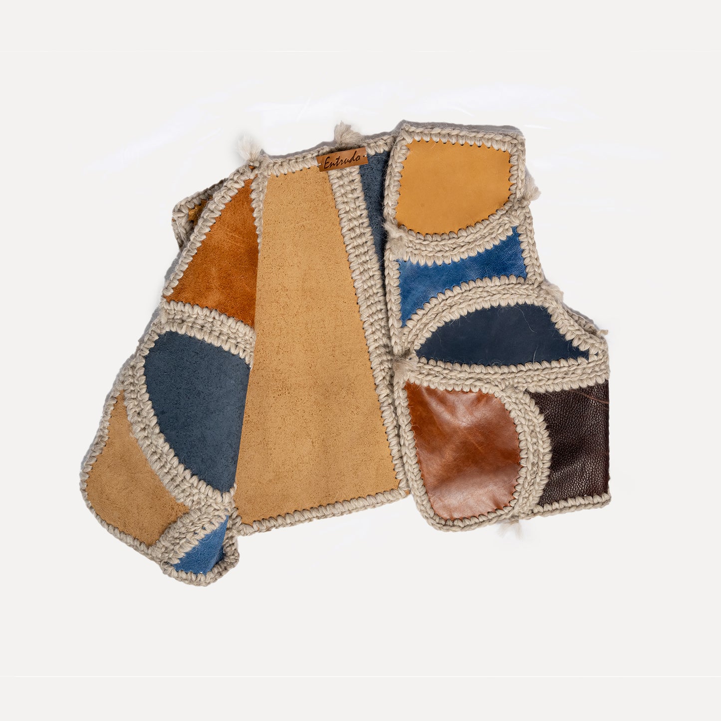 Paçó - patchwork leather vest with wool