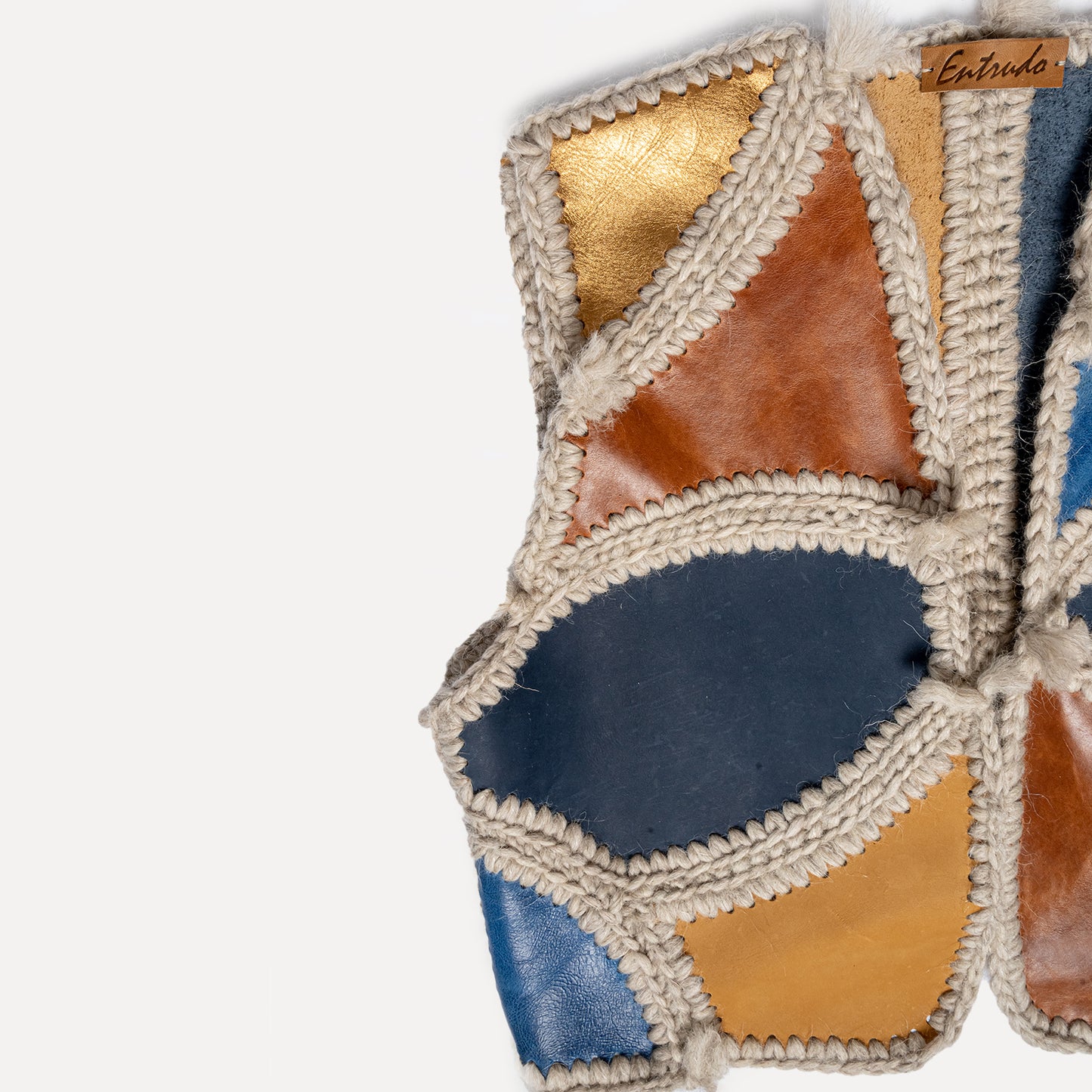 Paçó - patchwork leather vest with wool