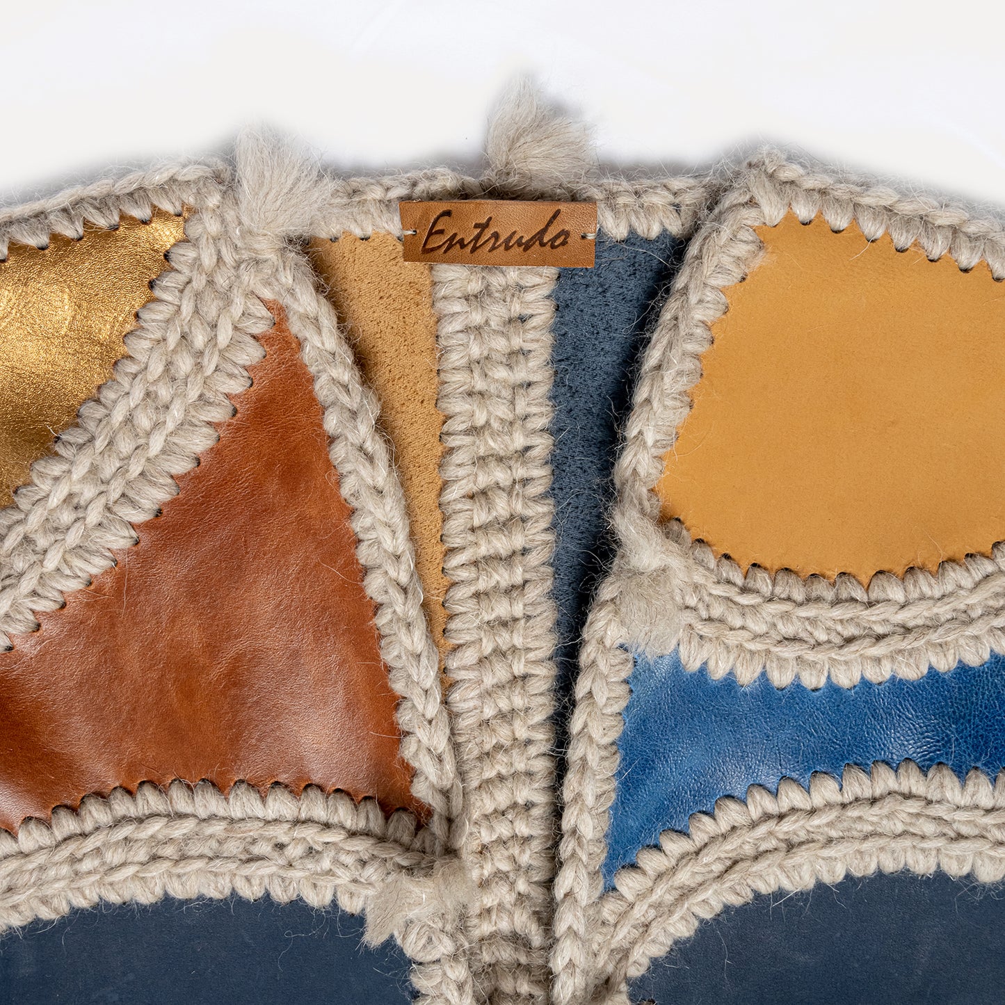 Paçó - patchwork leather vest with wool