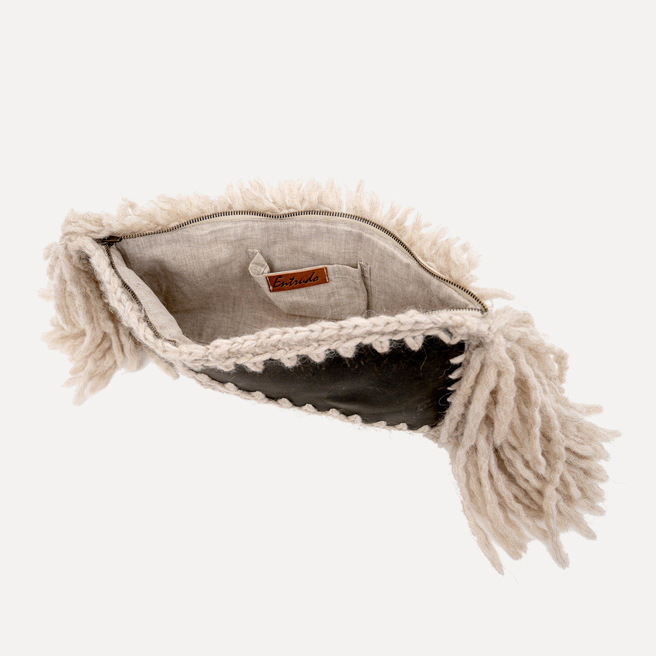 Paçó - leather patchwork clutch with wool