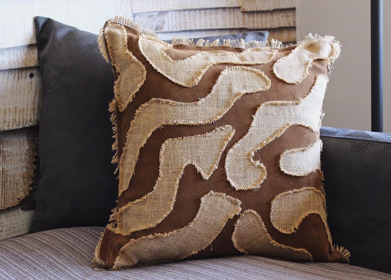 Chama - cushion with jute and leather patchwork