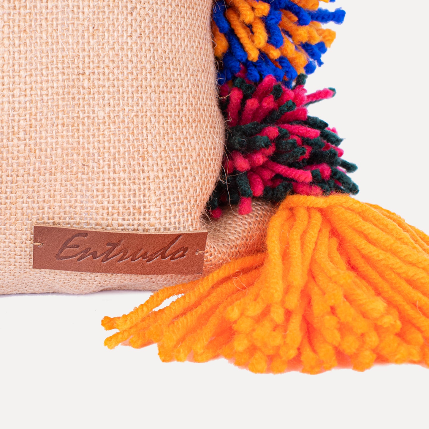 Onor - jute cushion with wool pom poms