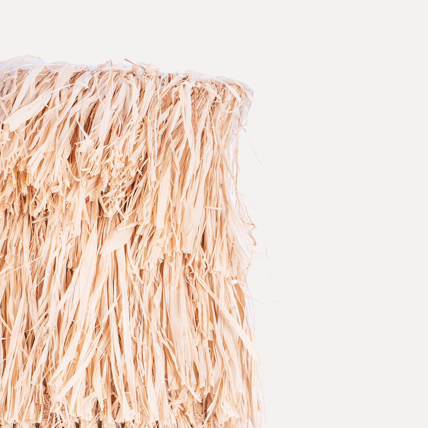 Cambres - cushion with handmade raffia fringes