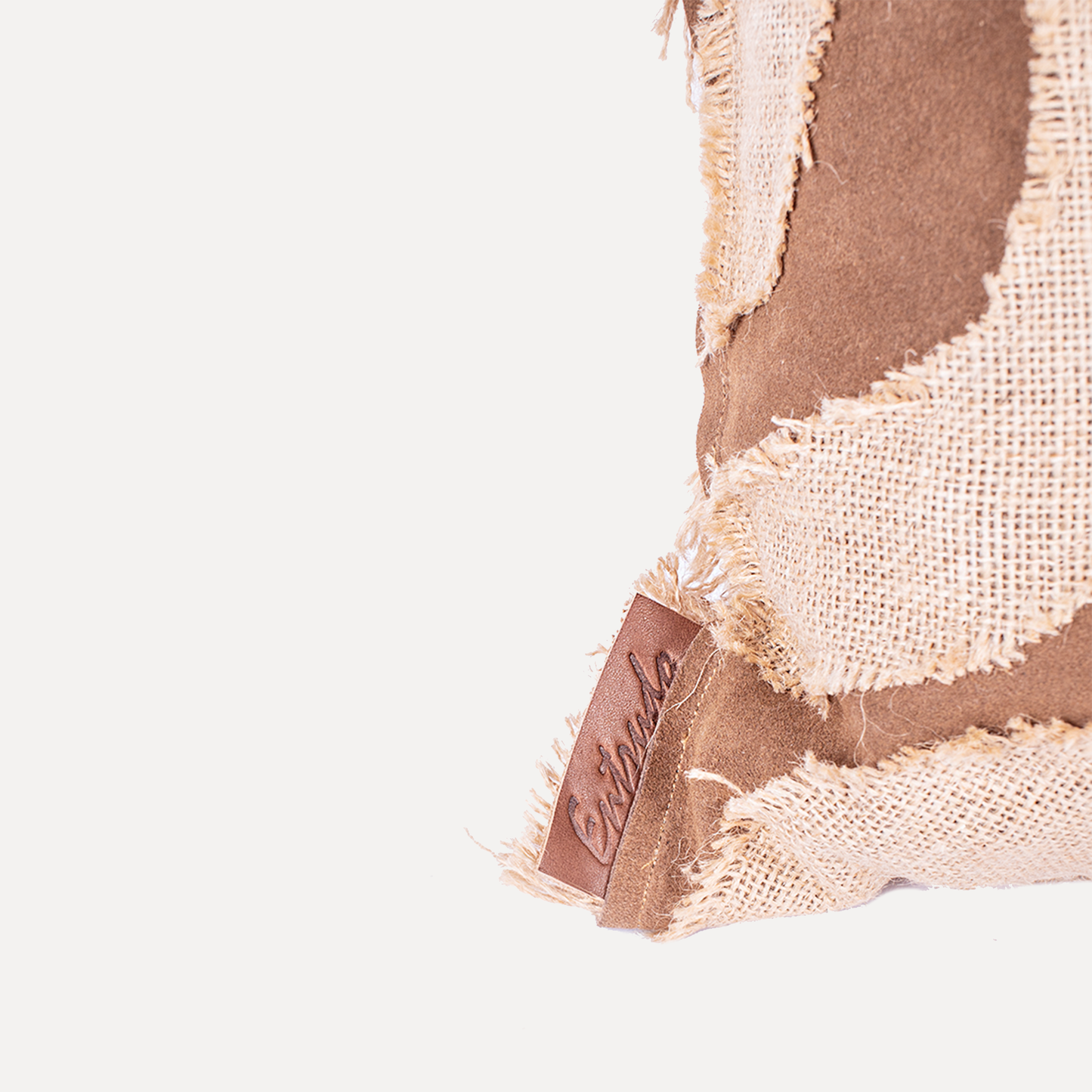 Chama - cushion with jute and leather patchwork