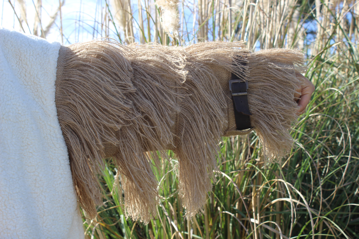 Varge - faux-fur jacket with jute and leather details