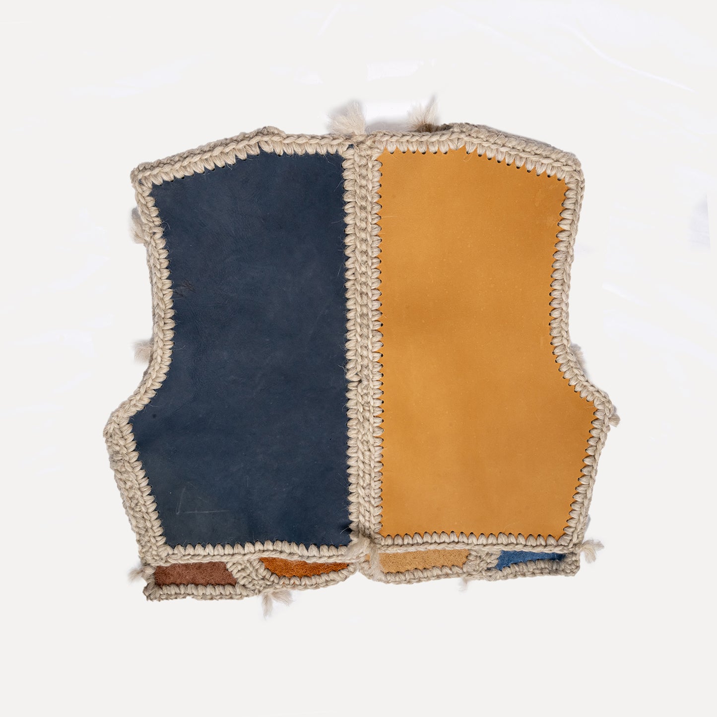 Paçó - patchwork leather vest with wool
