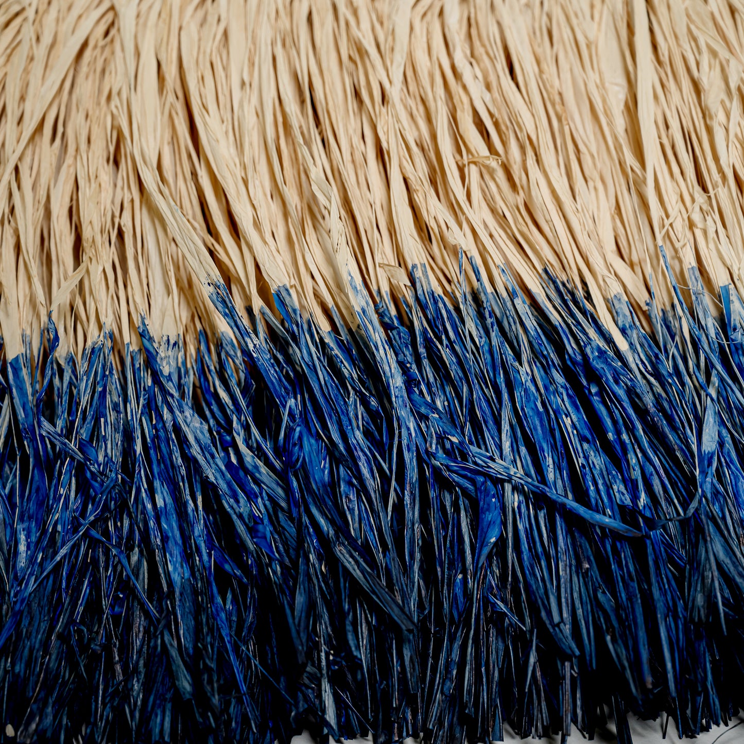 Cimbres - dégradé dyed raffia cushion in Comporta Blue