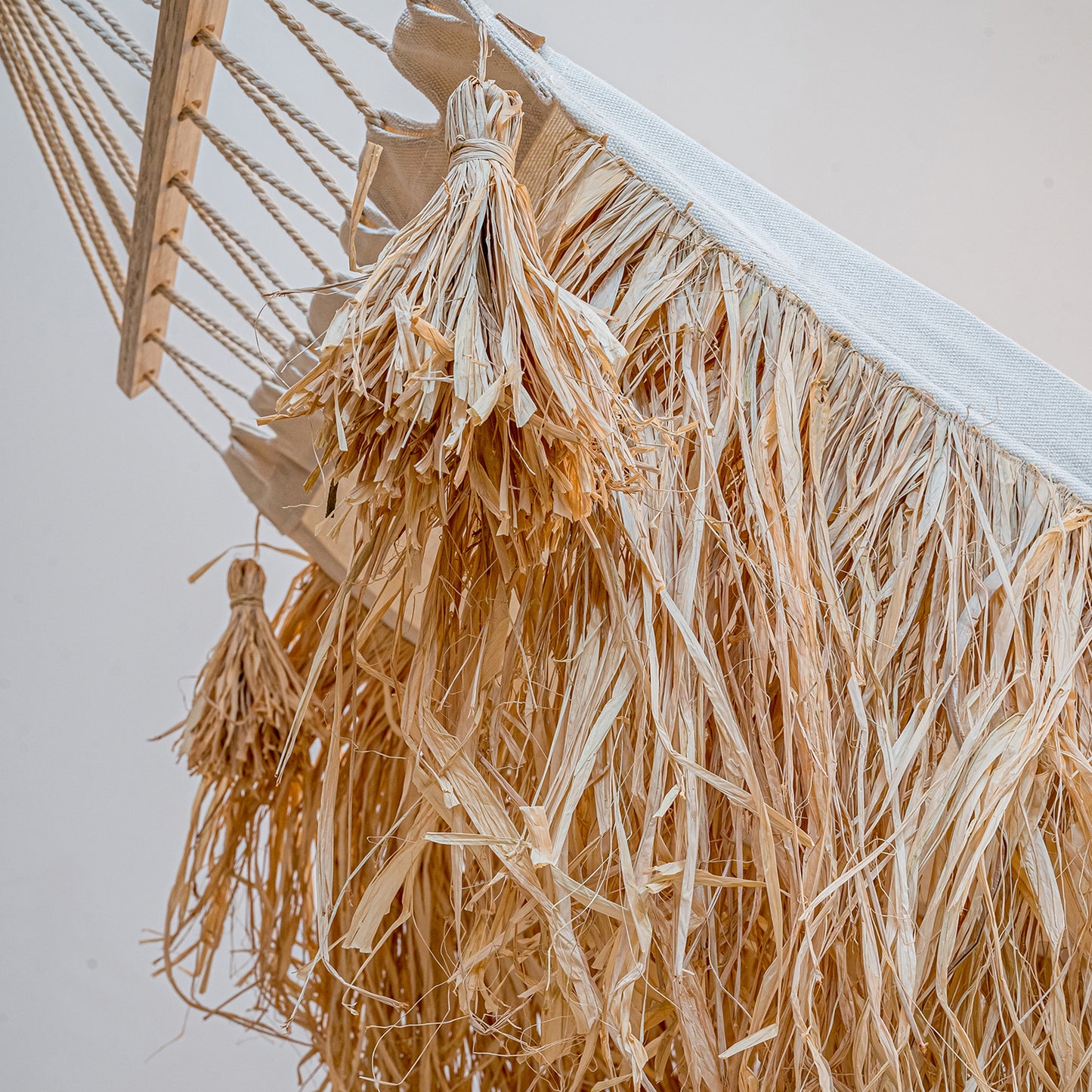 Cambres - garden hammock with handmade raffia fringes and tassels